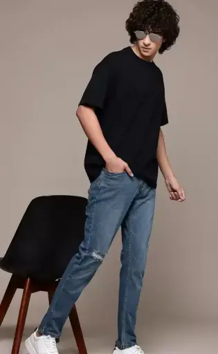 Roadster ter Lifestyle Co. Men Slim Tapered  Fit Low Distress Heavy Fade Stretchable Jeans